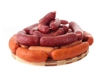 Image showing delicious sausages on board