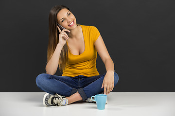 Image showing Woman talking at phone