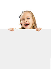 Image showing Cute Girl holding a whiteboard