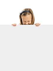 Image showing Cute Girl holding a whiteboard
