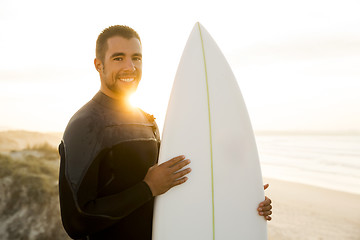 Image showing Surfing makes me smile