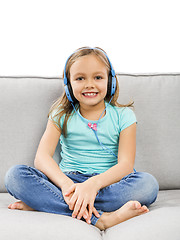 Image showing Cute girl listen music