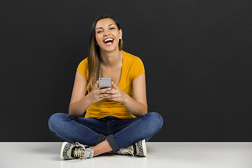 Image showing Girl with a smartphone