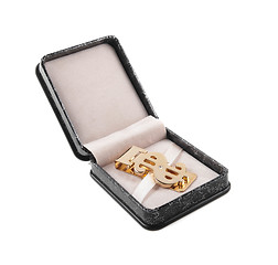 Image showing golden clip in box isolated