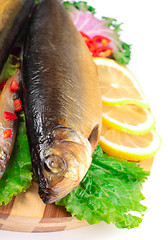 Image showing fish with lemon on plate