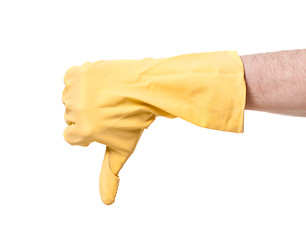 Image showing yellow rubber glove of a cleaning lady arm show thumbs down