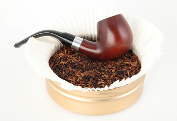 Image showing Wooden smoking pipe and tobacco