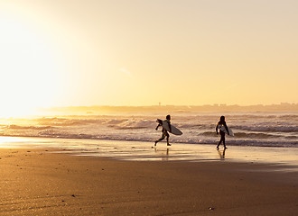 Image showing Surfers on the beach