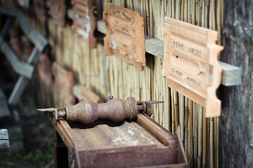 Image showing Antique machine for tile production