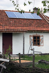 Image showing Old antique house with solar panels