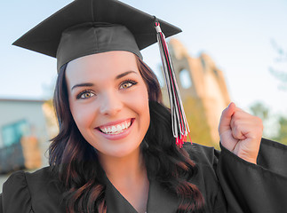 Image showing Happy Graduating Mixed Race Woman In Cap and Gown