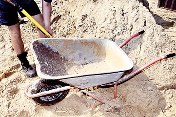 Image showing Working ship shovel sand in the construction truck to transport