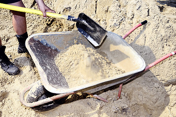 Image showing Working ship shovel sand in the construction truck to transport