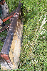 Image showing Bulldozer, destroying the plants growing on soil