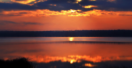 Image showing Sunrise over the lake early in the morning with beautiful clouds