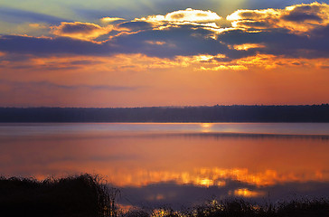 Image showing Sunrise over the lake early in the morning with beautiful clouds