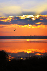 Image showing Sunrise over the lake early in the morning with beautiful clouds