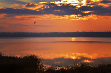 Image showing Sunrise over the lake early in the morning with beautiful clouds