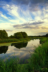 Image showing Summer landscape with the sky and clouds reflecting in the river