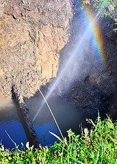 Image showing The water jet in the form of leakage in the damaged metal pipe at the production site