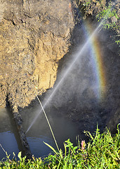 Image showing The water jet in the form of leakage in the damaged metal pipe at the production site