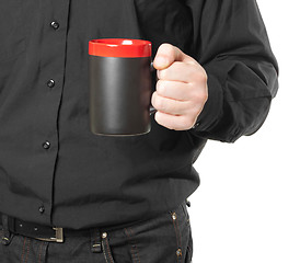 Image showing hand holding a cup of coffee on white