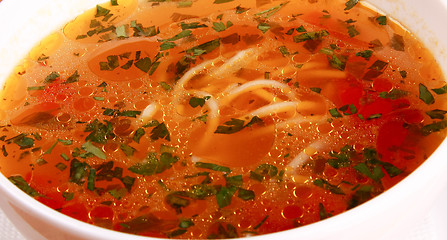 Image showing Bowl of Bright Red Creamy Tomato Soup with Yogurt