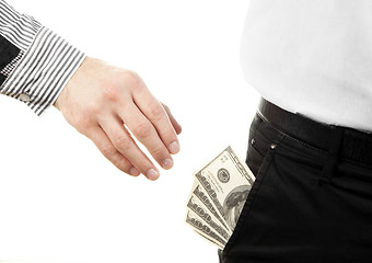 Image showing Hand taking money from pocket