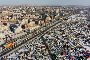 Image showing Train between old and new districts of Tyumen city