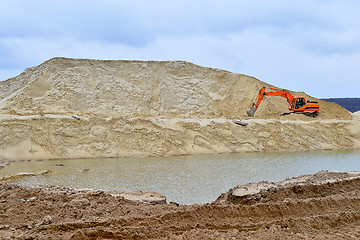 Image showing Working digger in a quarry produces sand