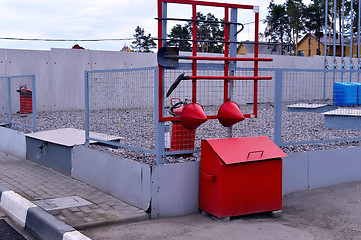 Image showing  Fire Shield on the wall. Set primary fire extinguishing equipment.