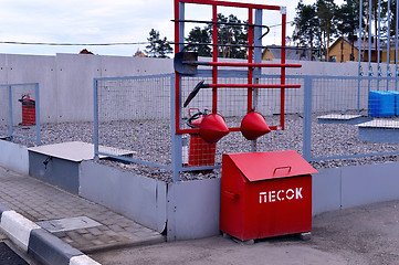 Image showing  Fire Shield on the wall. Set primary fire extinguishing equipment.