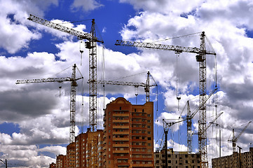 Image showing  Construction site with cranes on sky background