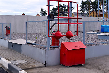 Image showing  Fire Shield on the wall. Set primary fire extinguishing equipment.