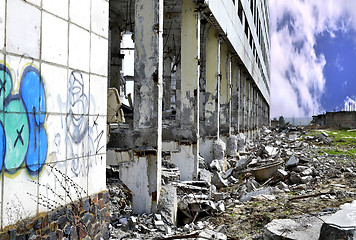 Image showing Pieces of Metal and Stone are Crumbling from Demolished Building Floors