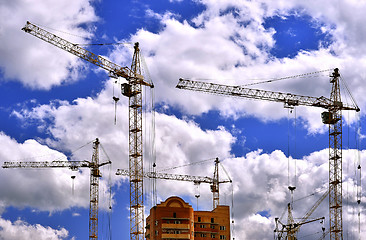 Image showing  Construction site with cranes on sky background