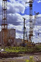 Image showing  Construction site with cranes on sky background