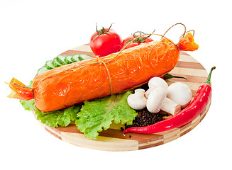 Image showing sliced sausage with vegetables and red papper