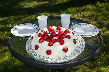 Image showing Summer cake at a table