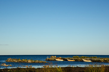 Image showing Small harbor with white boats