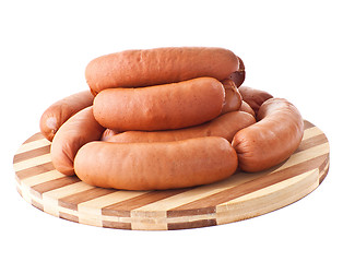 Image showing delicious sausages on board