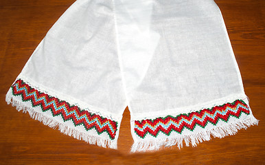 Image showing embroidered pattern by threads