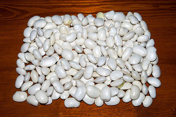 Image showing white kidney beans lying on the table