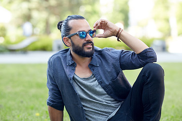 Image showing man in sunglasses at city street or park