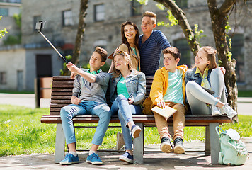 Image showing happy teenage students taking selfie by smartphone