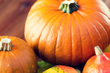 Image showing close up of pumpkins on wooden table at home