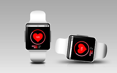 Image showing smart watches with heart rate icon on screen