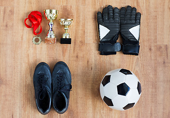 Image showing ball, football boots, gloves, cups and medal