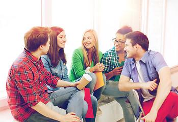 Image showing students communicating and laughing at school