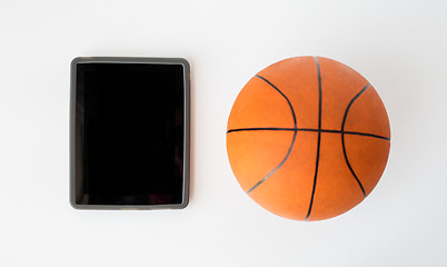 Image showing close up of basketball ball and tablet pc computer